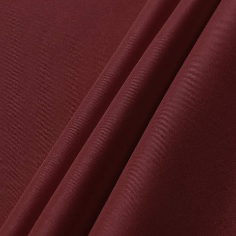 Sancua burgundy round tablecloth on buffet display creates elegant food presentation.