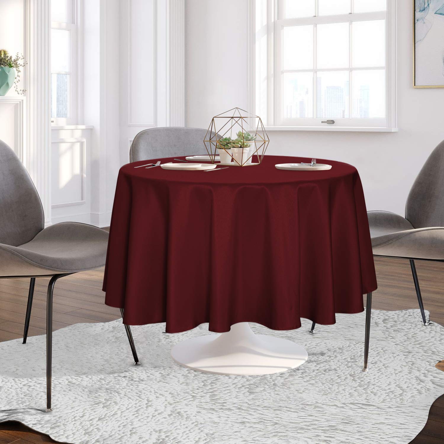 Sancua burgundy round tablecloth fabric highlights stain resistance for easy cleanup.