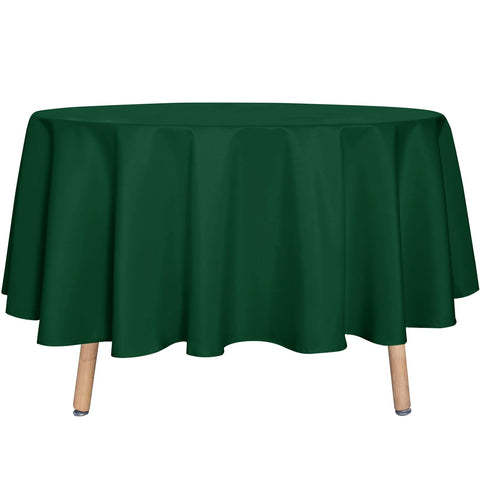 Sancua round tablecloth 90-inch hunter green on dining table protecting surface from spills