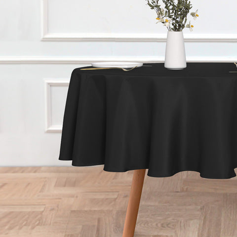 Sancua black round tablecloth on a dining set for elegant meals.