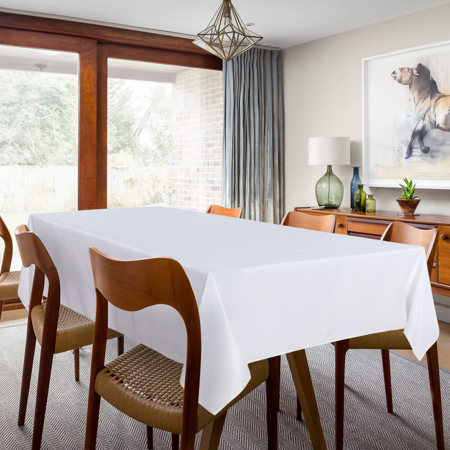 Sancua white tablecloth 60x84, stain resistant for family meals and gatherings.