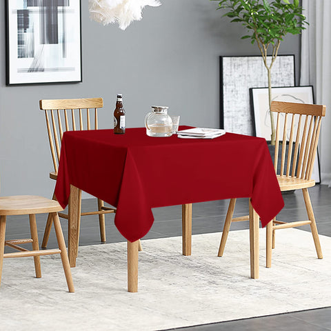 Sancua red tablecloth on buffet table during party.