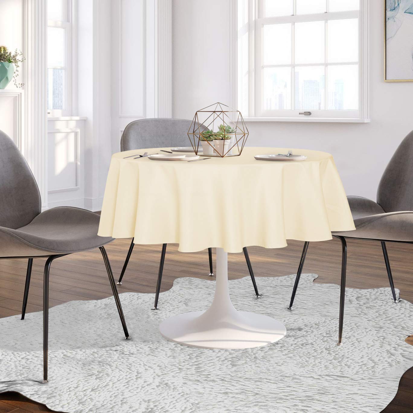 Sancua water-resistant beige tablecloth suitable for indoor and outdoor dining.