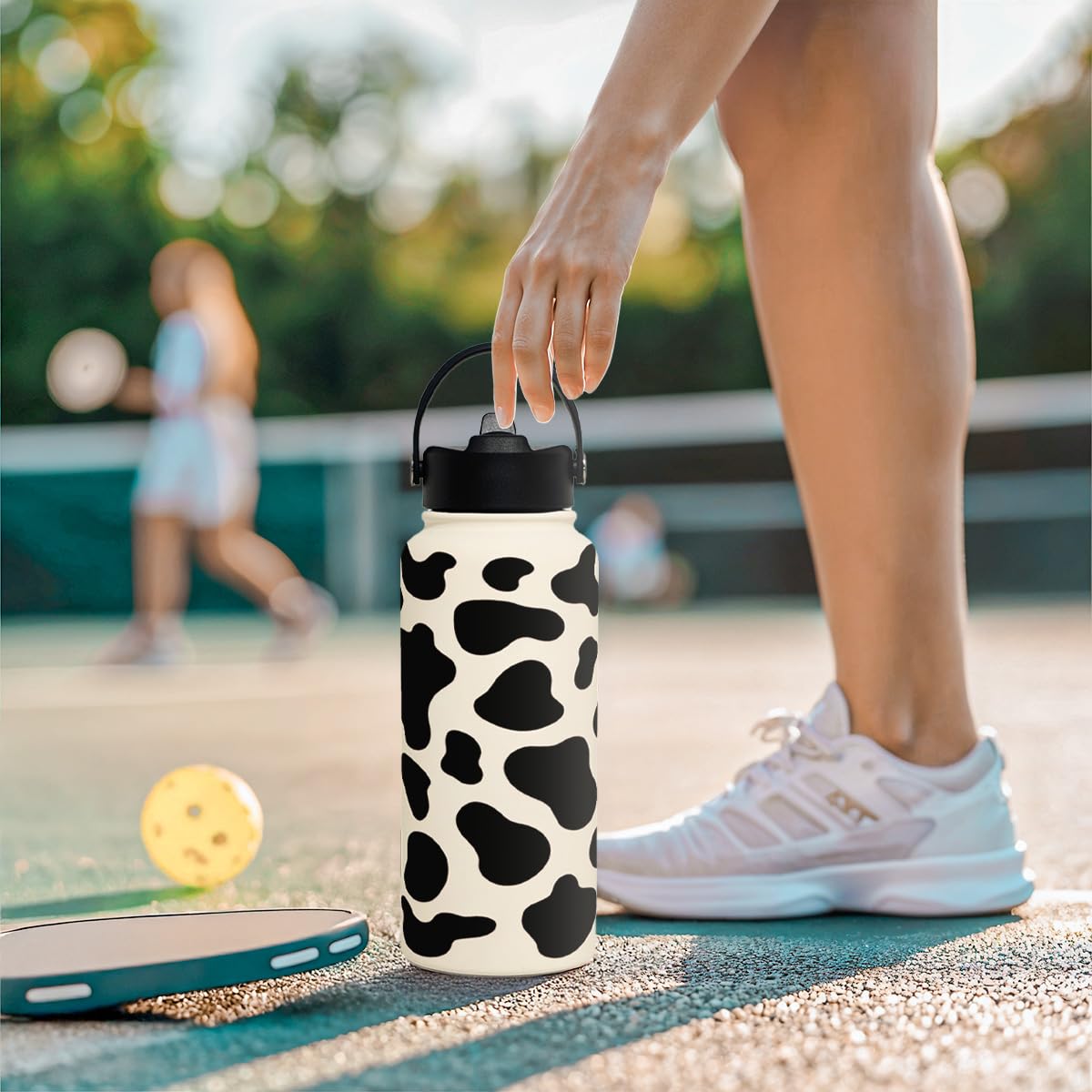 SANDJEST bottle in backpack demonstrates portable hydration for outdoor activities