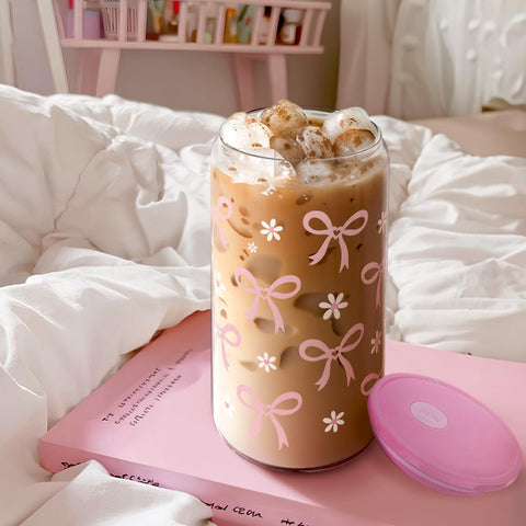 SANDJEST Bow Glass Can on a desk with iced coffee, perfect for work.