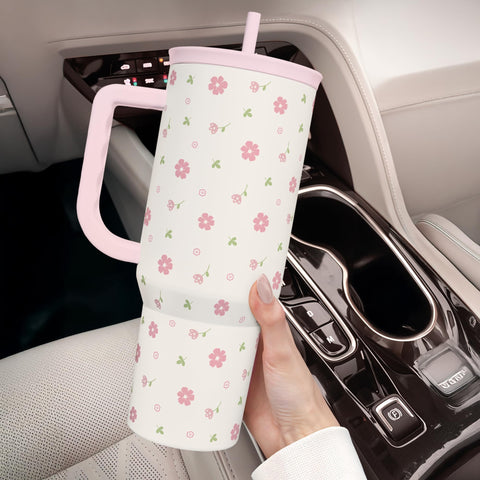 SANDJEST tumbler close-up shows vibrant floral pattern and finish.