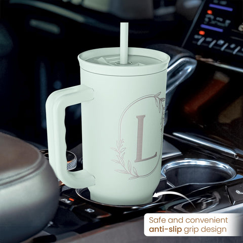 SANDJEST handle-friendly tumbler shown in use for commuting.