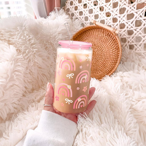 SANDJEST Rainbow glass tumbler on the go, perfect for commuting beverages.