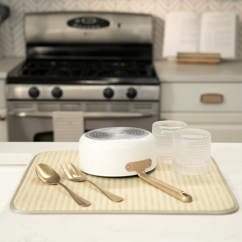 S&T INC. mat under a dish rack catches drips and protects surfaces.