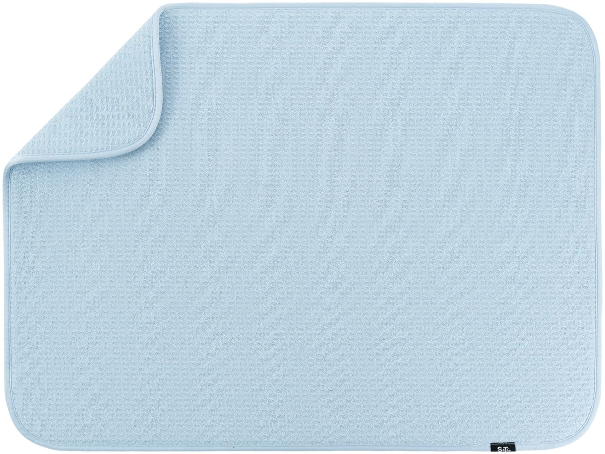 S&T INC. Dish Drying Mat XL on counter absorbs water to keep surfaces dry.