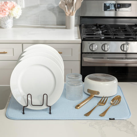 S&T INC. XL under a drying rack protects counter from drips.