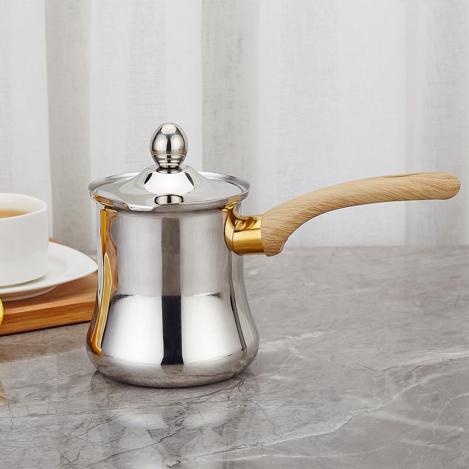 SANQIAHOME 720ml pot highlights bakelite handle for safe pouring.