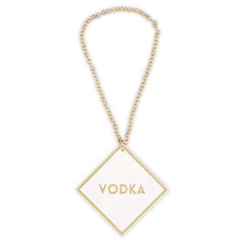 Whiskey label Santa Barbara Design Studio leather tag with gold accents.