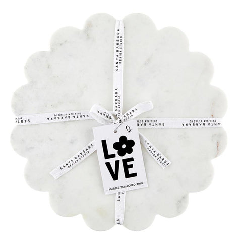 Santa Barbara Design Studio marble charcuterie board with a round scalloped edge for elegant entertaining.