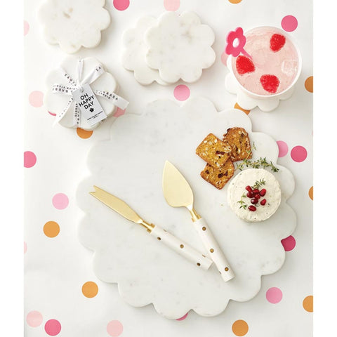 Santa Barbara Design Studio scalloped edges add charm to cheese boards and desserts.
