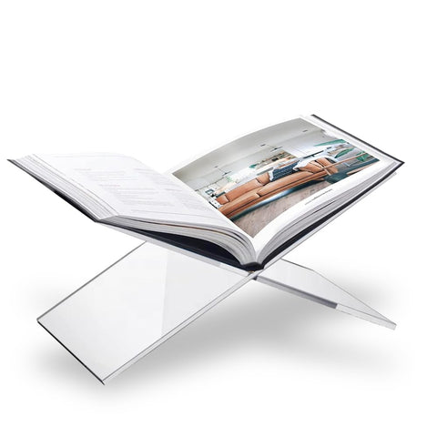 Sarvo Kitchen SK acrylic book stand on a coffee table for elegant display.
