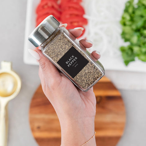 Savvy & Sorted salt and pepper grinder system keeps seasoning organized.