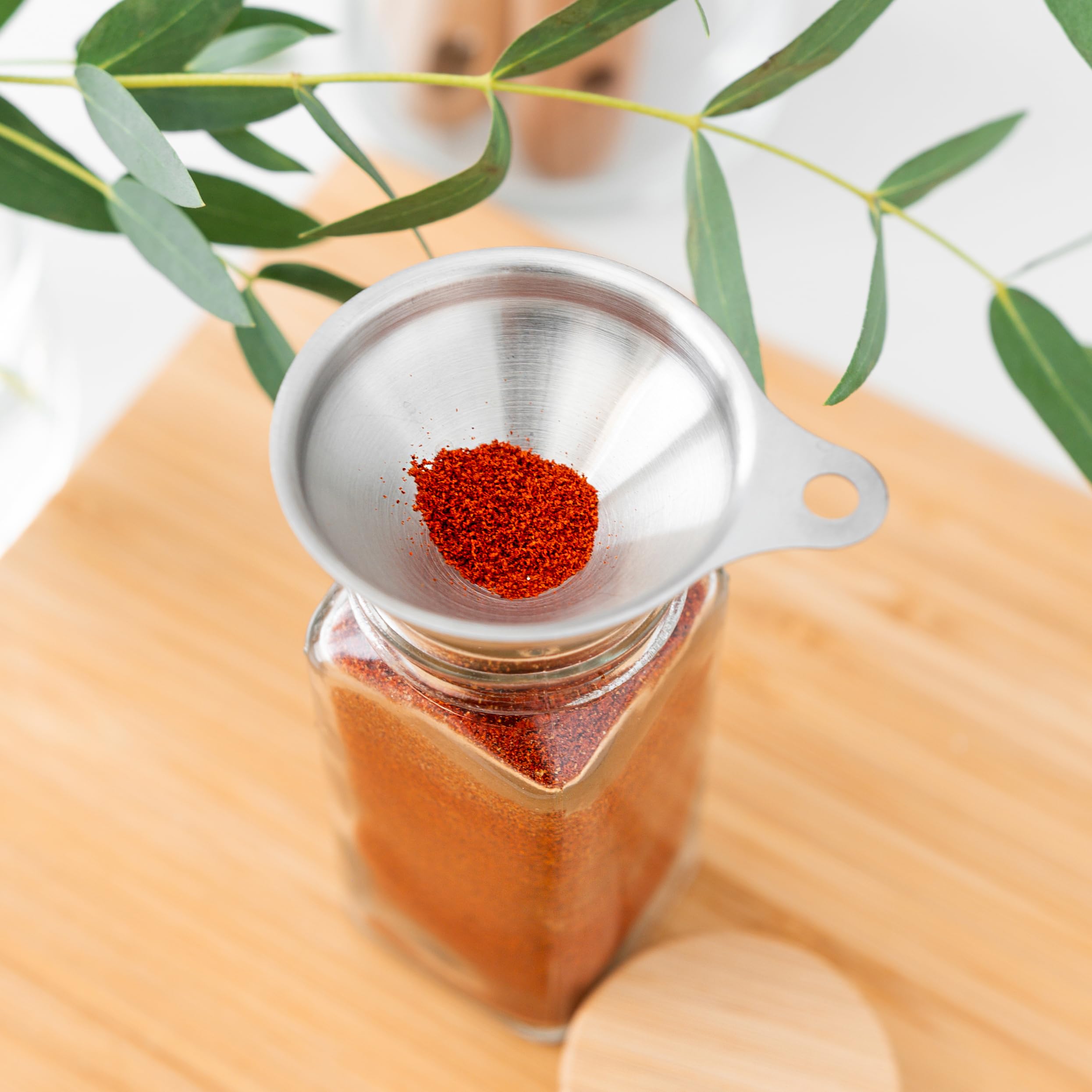 Stainless steel funnel used for spill-free spice transfers