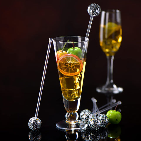 Sawysine disco ball stirrers illuminate bar ambiance with sparkling reflections.