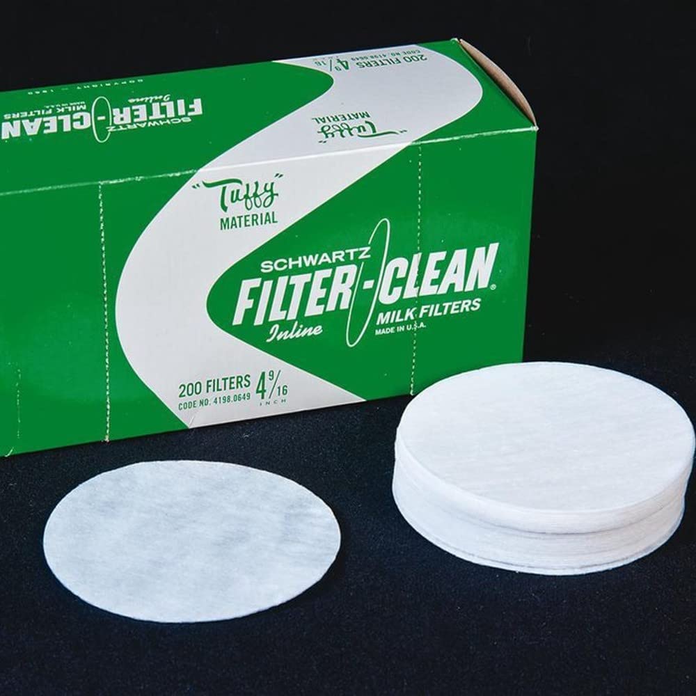 The Schlueter small milk strainer disk (4-9-16 inch) enables quick flow filtration.