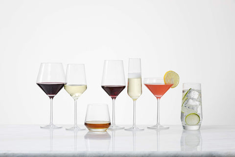 Schott Zwiesel Burgundy wine glass in use for tasting and toasts.