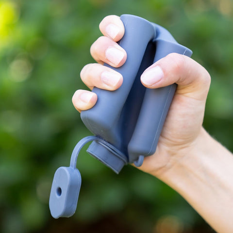 Secret Swig compact 8oz capacity fits pockets for on-the-go use.