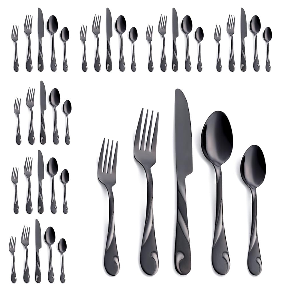 Seeshine black silverware set for eight on a table with elegant dinnerware
