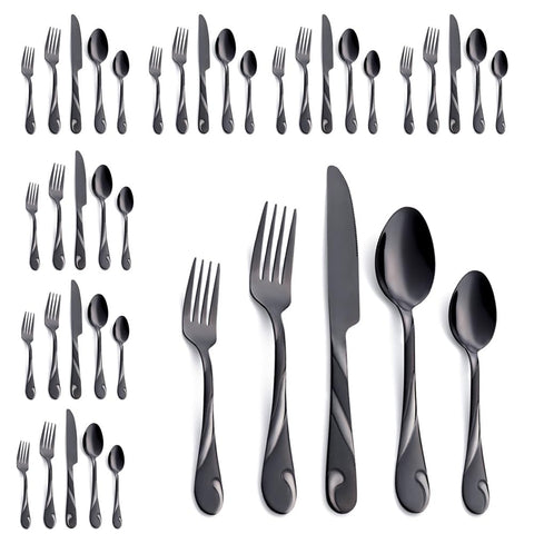 Seeshine black silverware set for eight on a table with elegant dinnerware