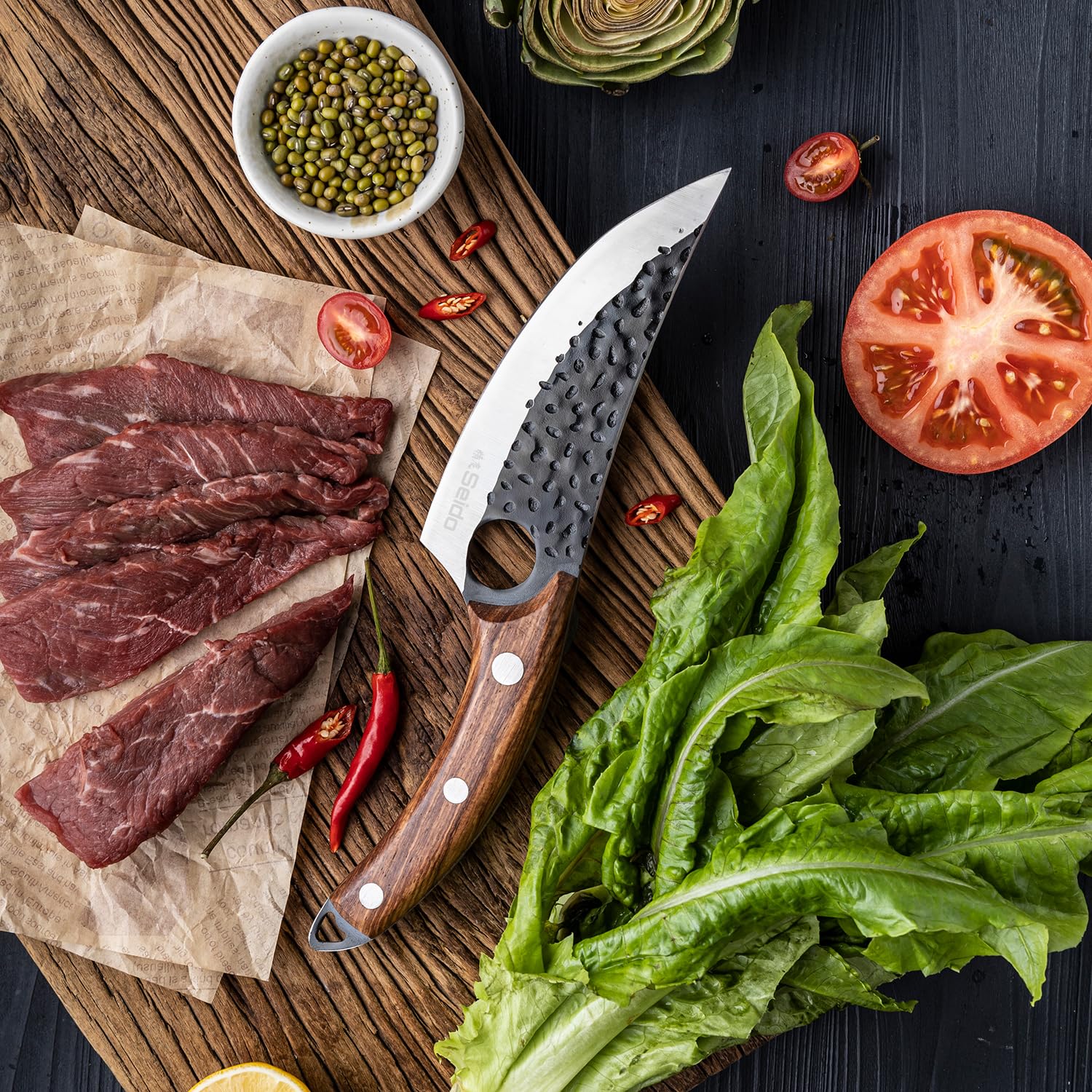 Seido Knives Kyodai grip close-up demonstrates ergonomic handle for extended use.