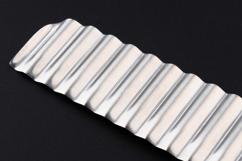 Seki Japan cheese knife crinkle-cut fruit slice with pristine edge