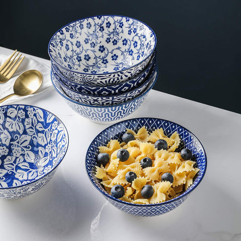 Selamica blue-white bowls stack neatly for tidy cabinet storage.