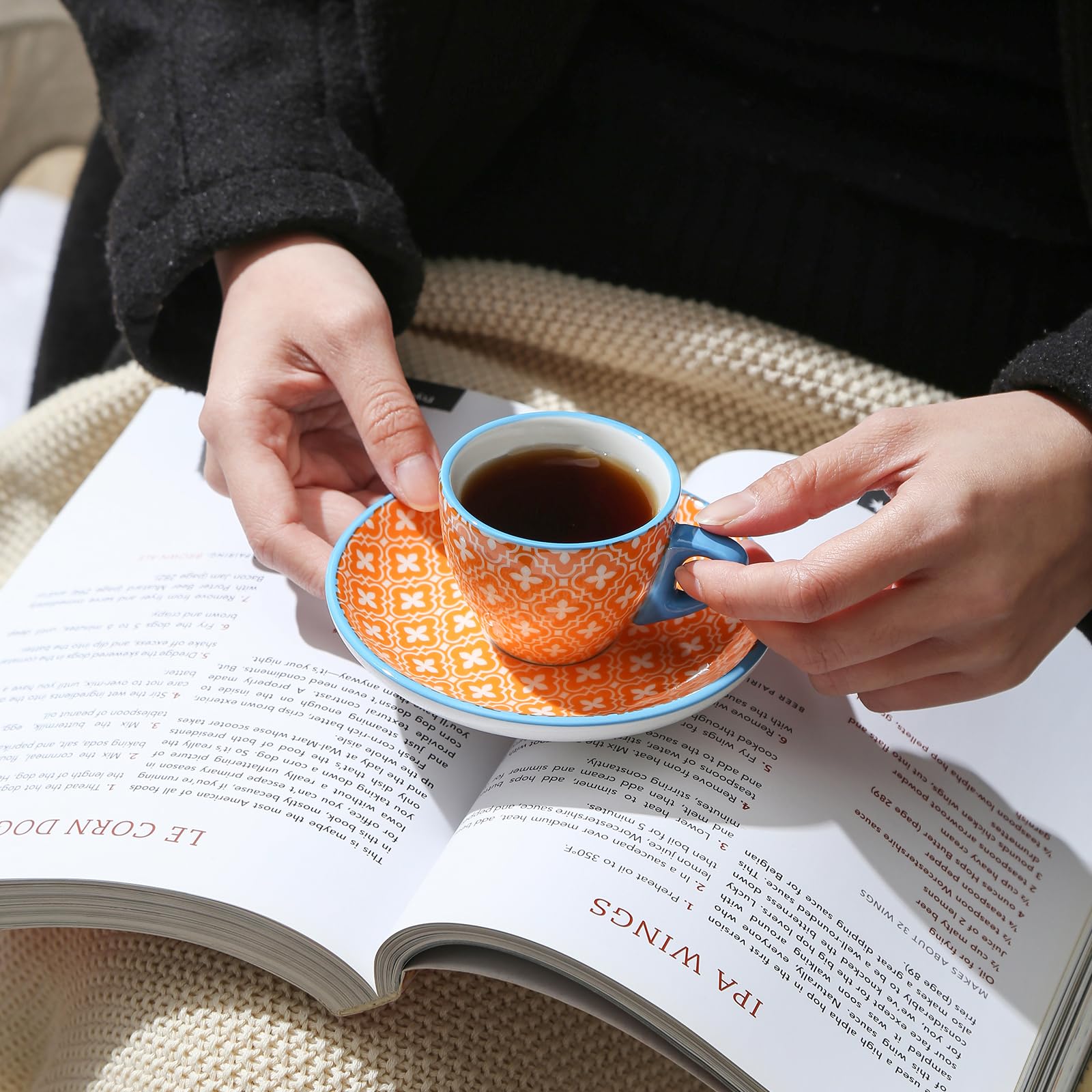 Selamica demitasse cups with saucers shown in an elegant coffee service