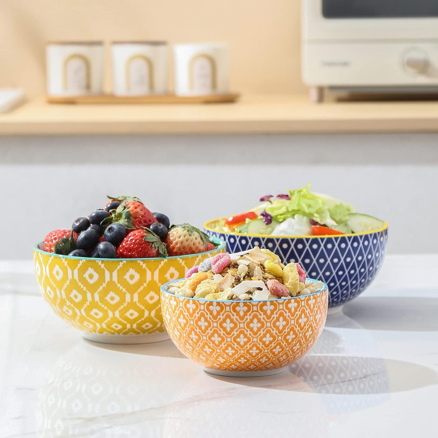 Selamica stackable bowls with smooth glaze for simple cabinet storage.