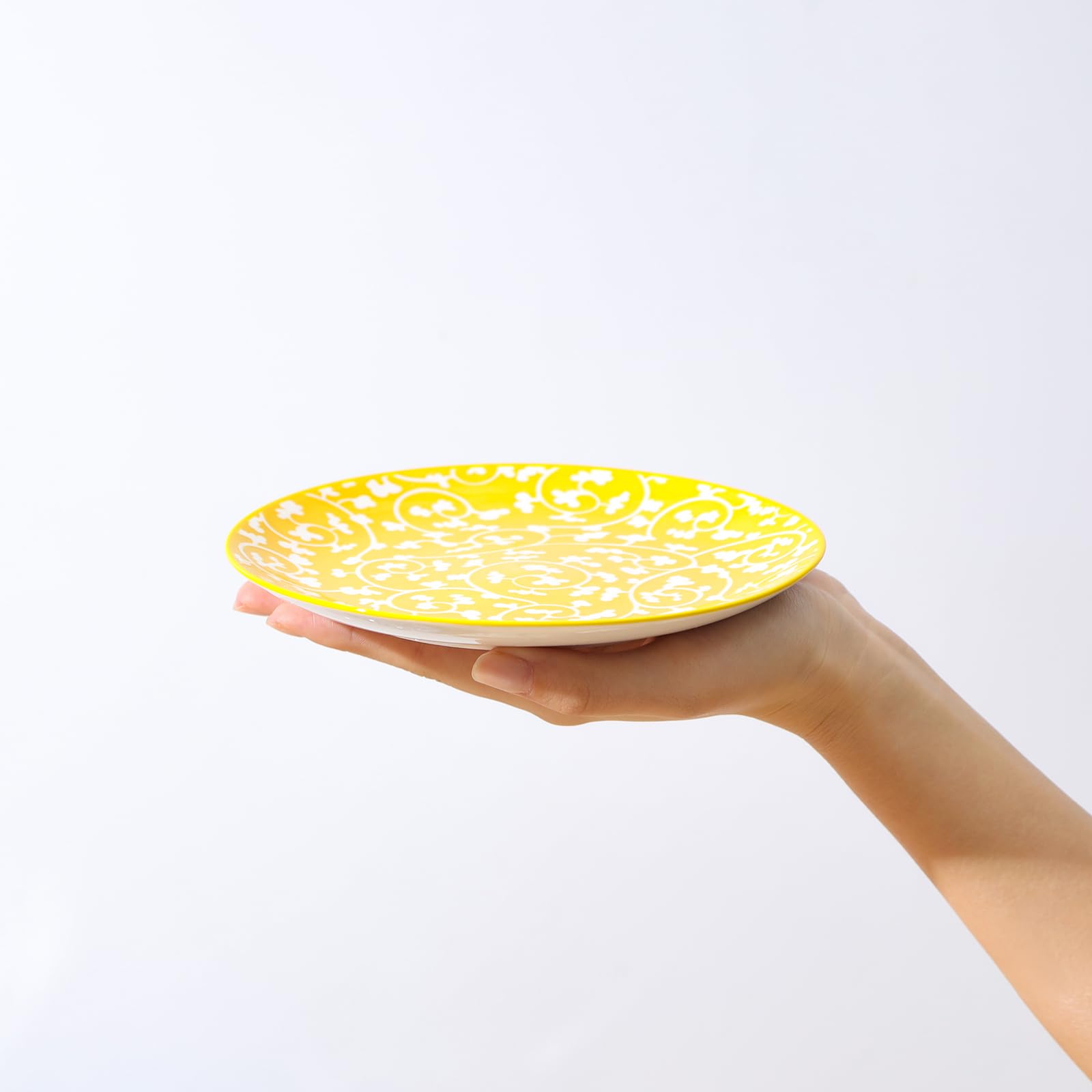 Selamica flower-pattern plates add color and charm to any table setting.