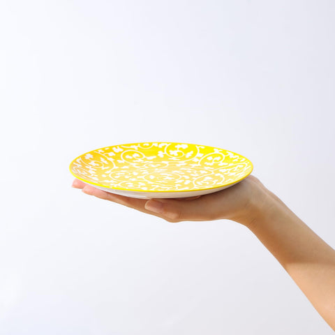 Selamica flower-pattern plates add color and charm to any table setting.