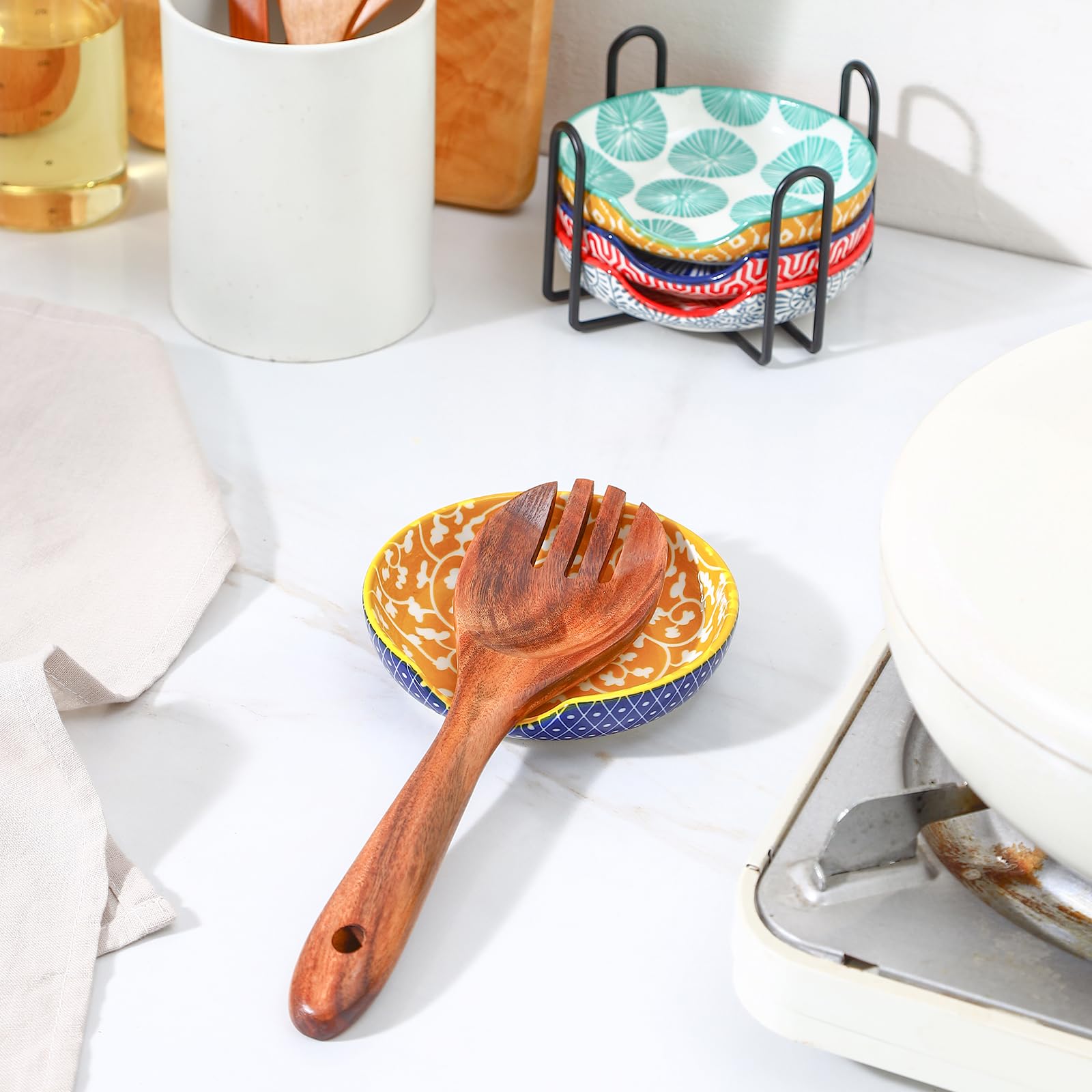 Selamica four-piece rest with circular depressions to hold spoons and small tools.