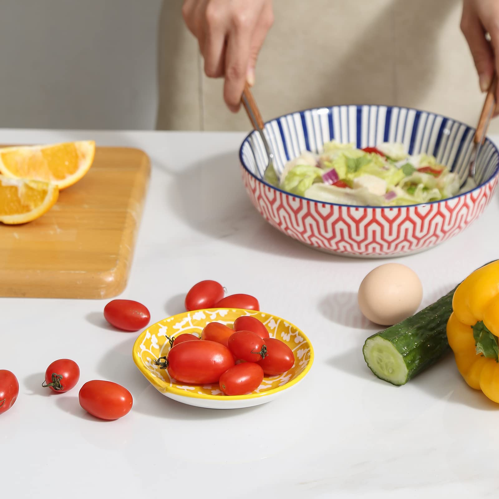 Selamica spoon rest with assorted colors pattern complements modern cookware while keeping utensils off the counter.