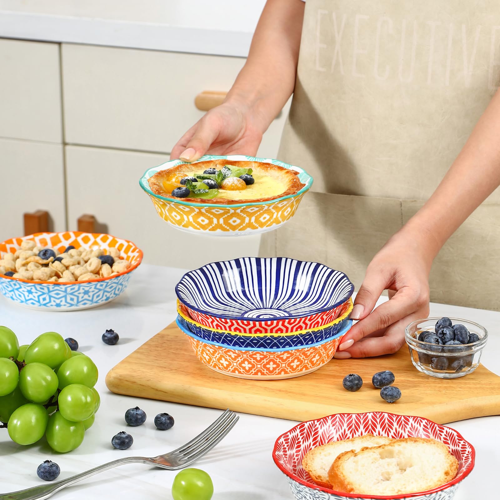 Selamica stackable mini pie pans simplify storage in kitchen cabinets.