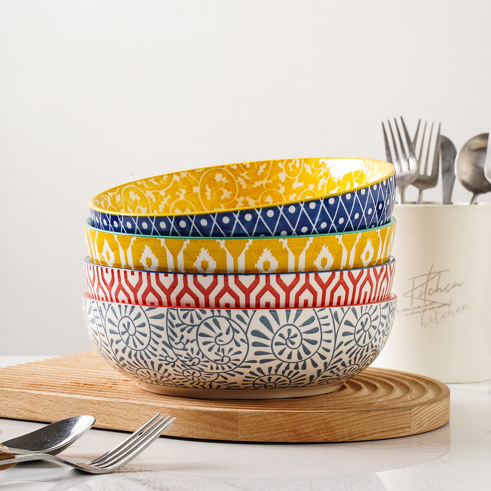 Selamica stackable porcelain bowls save cabinet space between uses.