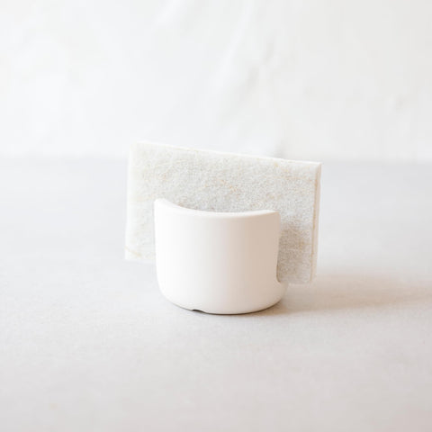 Selegna sponge holder front view with quick-dry diatomaceous earth.