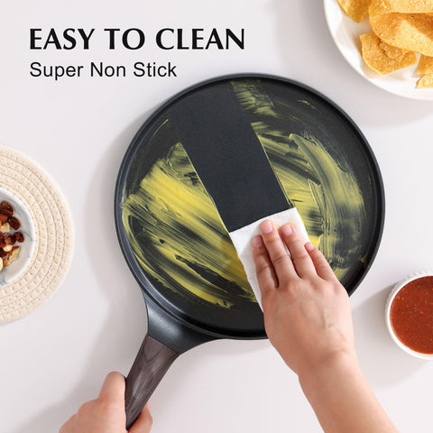 SENSARTE crepe pan includes wooden spreader for smooth dough spreading.