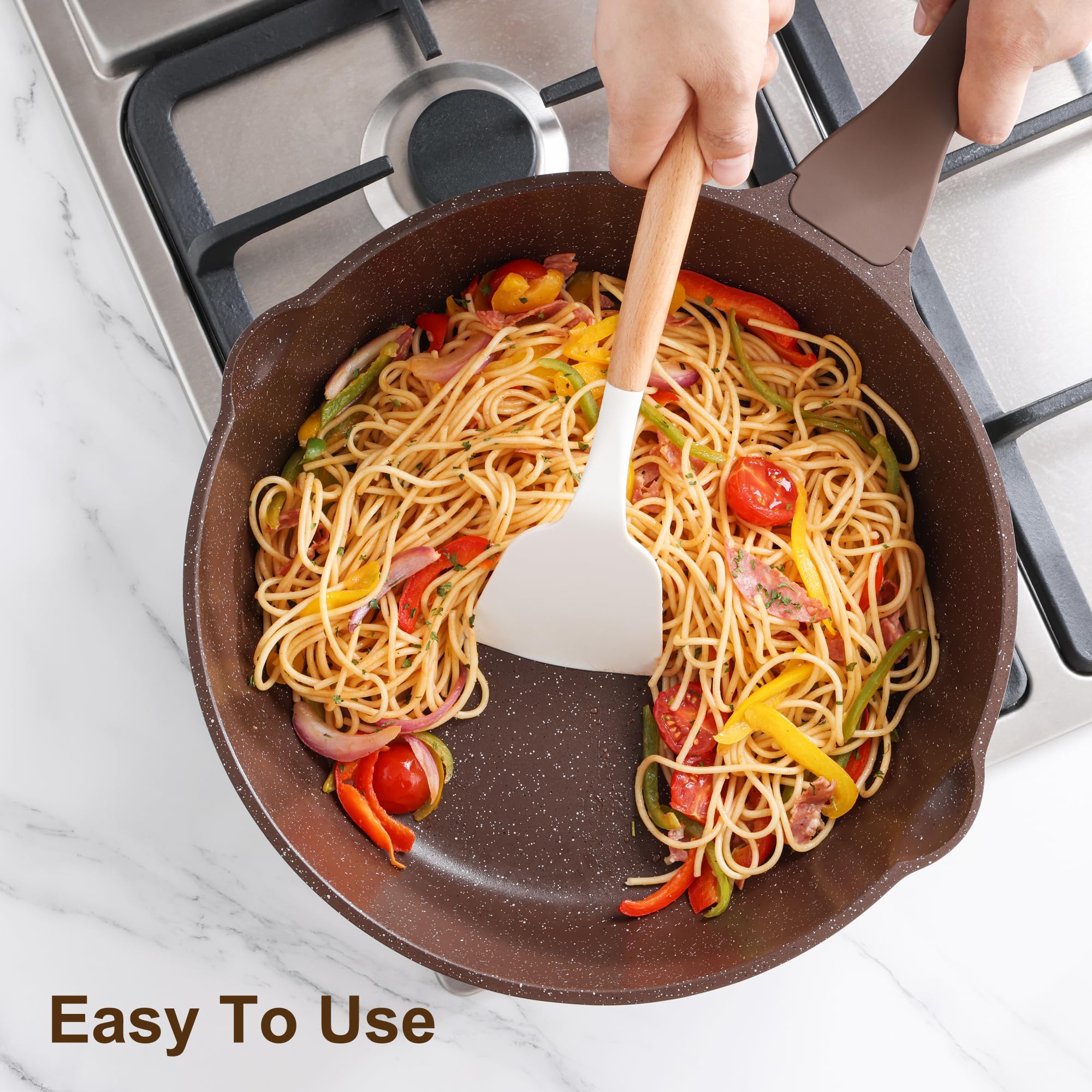SENSARTE silicone spatula head close-up, smooth heat resistance for gentle flipping.
