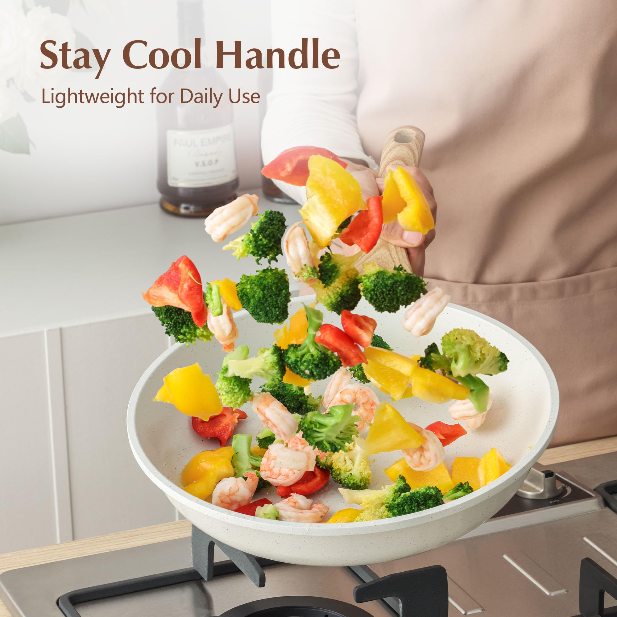 SENSARTE tempered-glass lid helps prevent splatter while cooking.