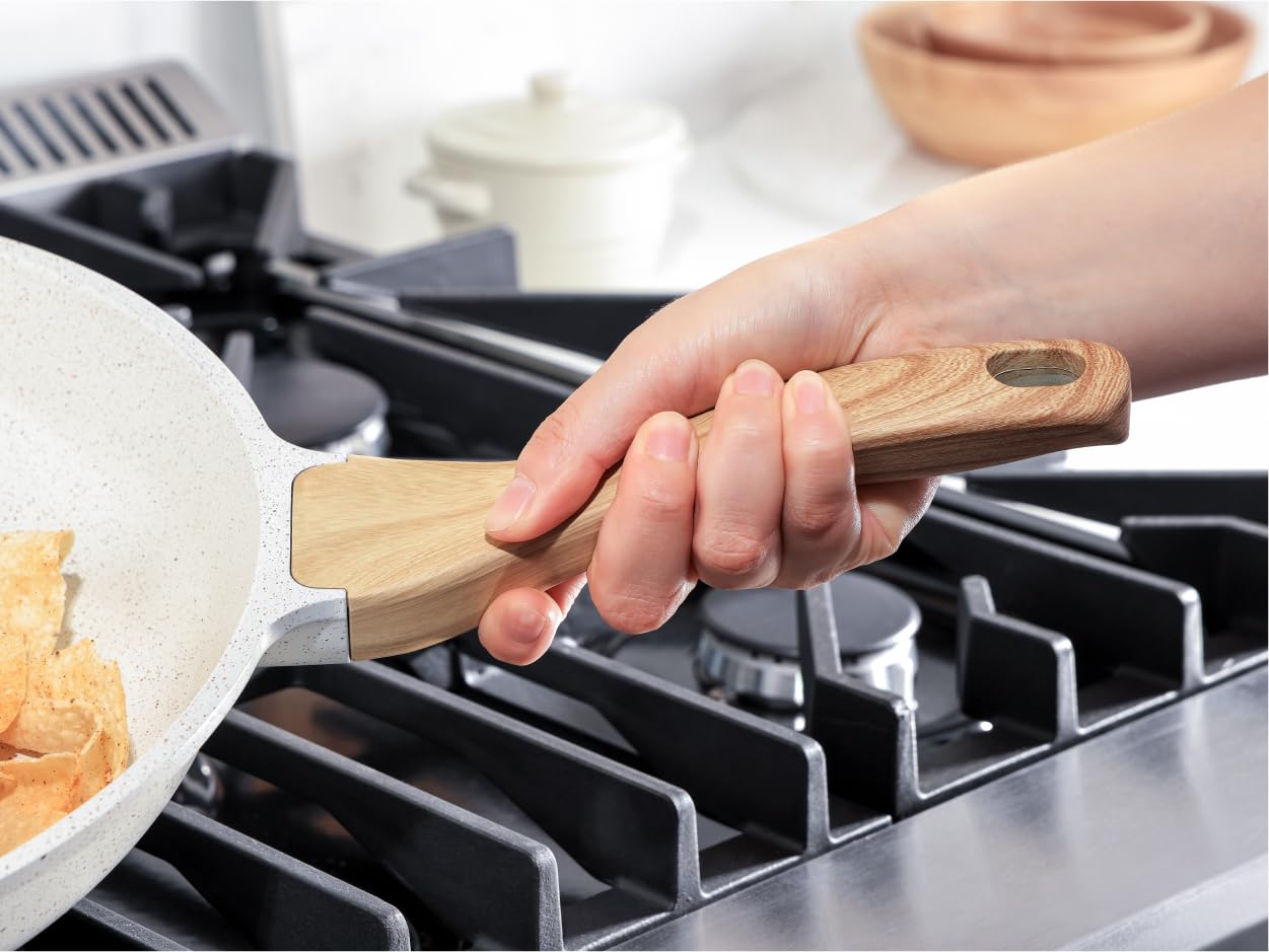 Sensarte white ceramic pan in a modern kitchen setup for daily use