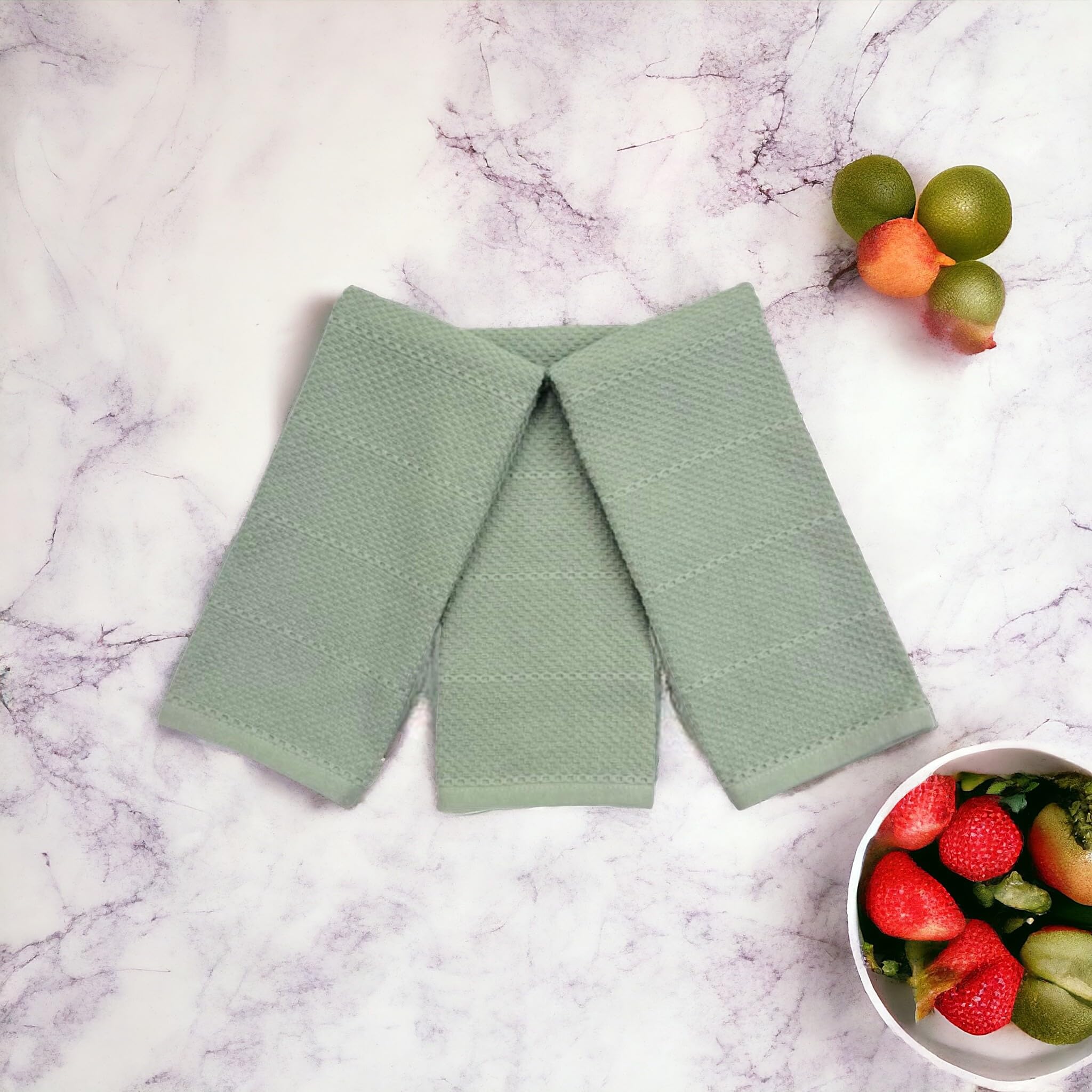 Serafina Home sage green towels reveal oversized 18x28 inch size for easy drying.