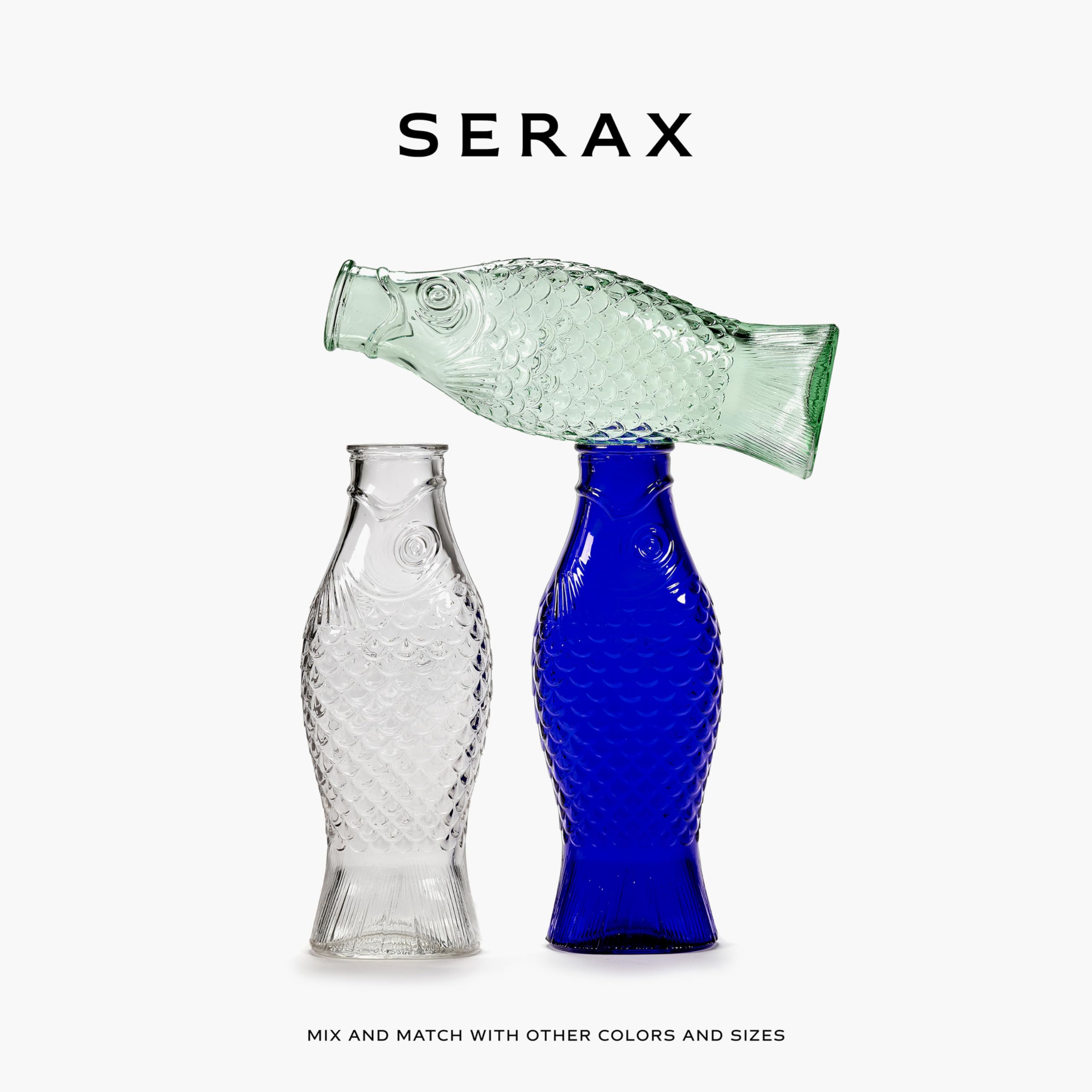 Serax Fish & Fish water pitcher on dining table setting, versatile for drinks.