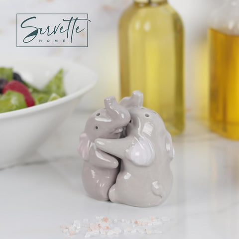Close-up of Hugging Elephants shakers highlighting whimsical design and easy seasoning.
