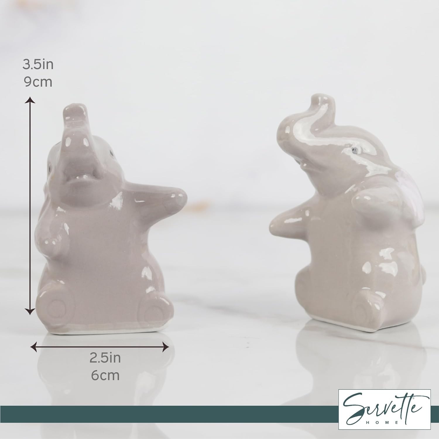 Kitchen decor shot featuring Servette Home Hugging Elephants shakers.