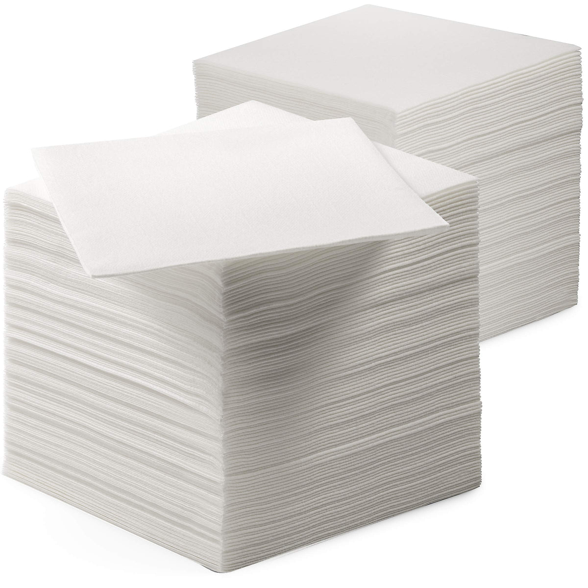 Servietto linen-feel beverage napkins folded on a formal table for clean spills.