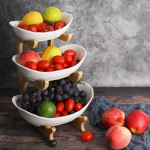 Seven Sparta fruit bowl on bamboo stand, countertop display for fresh fruit.